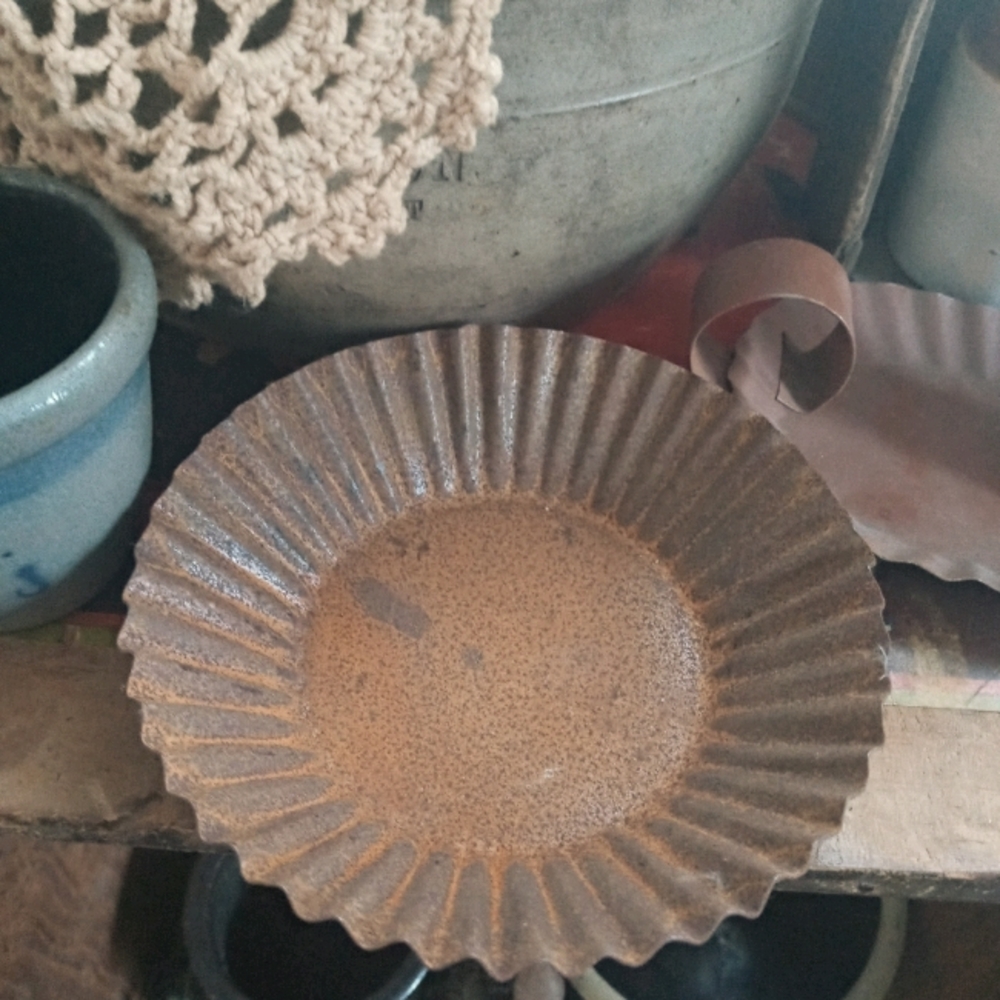 Primitive tin candle holder